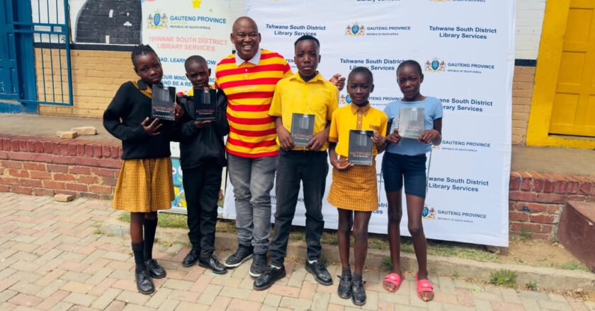 School celebrates with excitement as author donates books at opening of the school’s new library 